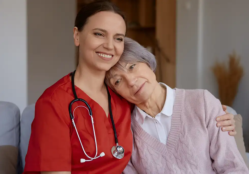 Medical social worker meeting with a patient and family