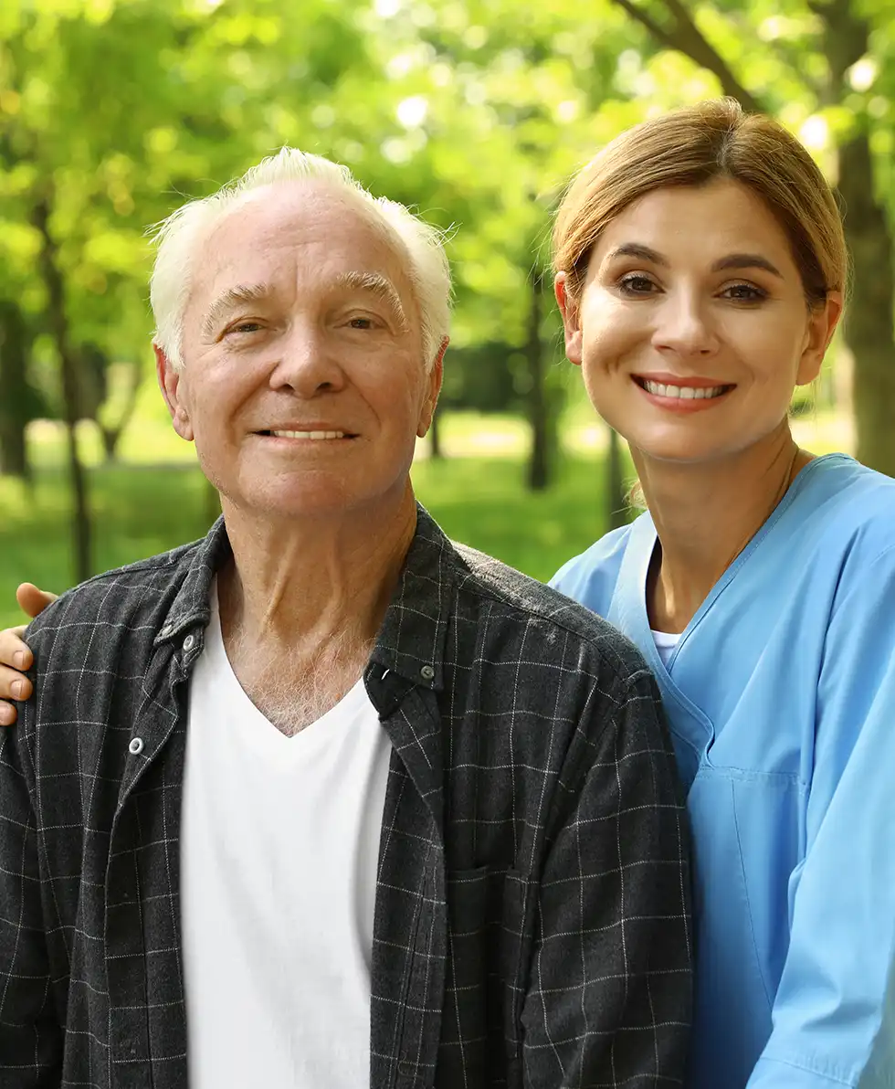 Occupational therapist assisting a senior with daily activities